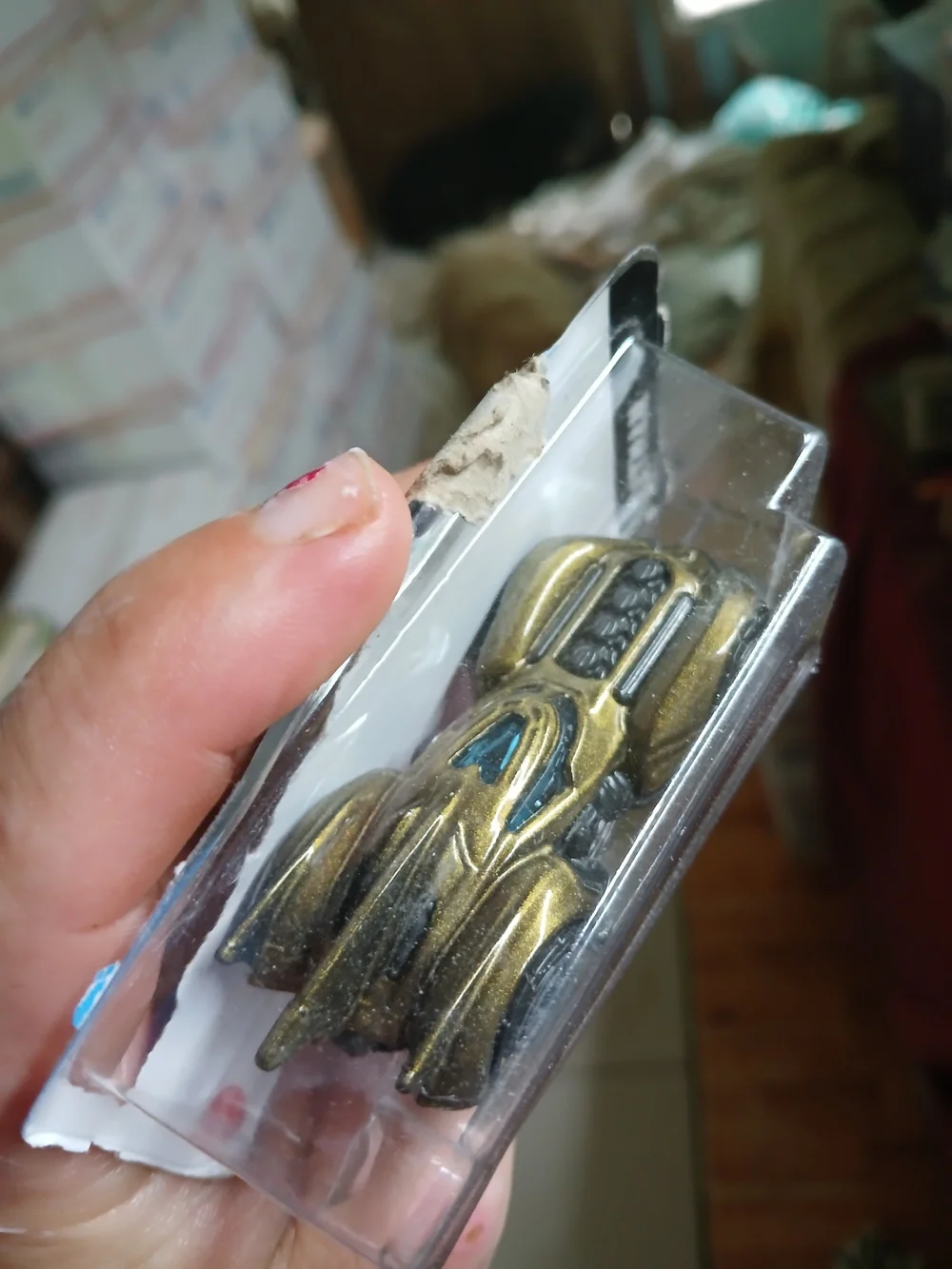 Hot Wheels Batman: Arkham Asylum Batmobile (specifically the gold/bronze variant